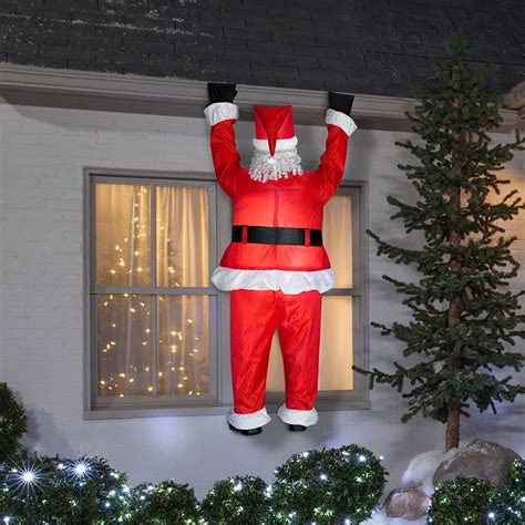 blow up hanging santa|Gemmy Inflatable Realistic Santa Hanging from Gutter.